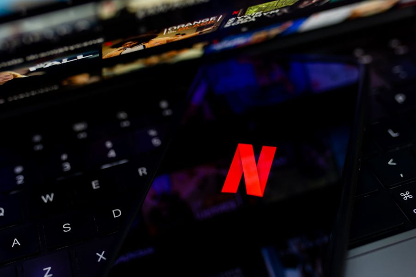 Netflix cuts ad prices, rethinks Microsoft deal in pursuit of growing revenue