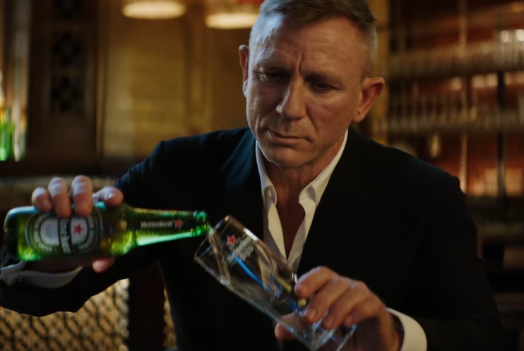 Daniel Craig likens Bond film delay to waiting for a cold Heineken in new ad